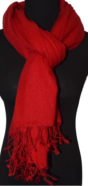 Empar is wearing a full size Sagarmatha shawl  in  Jester Red, SFT-242, with tassels